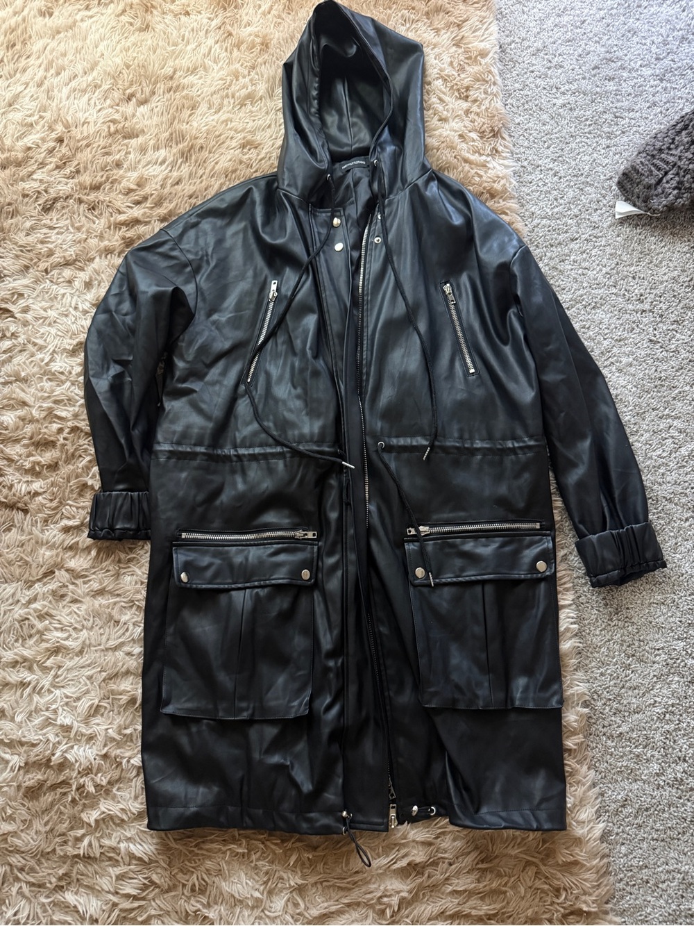 PrettyLittleThing Black Hooded Faux Leather Raincoat